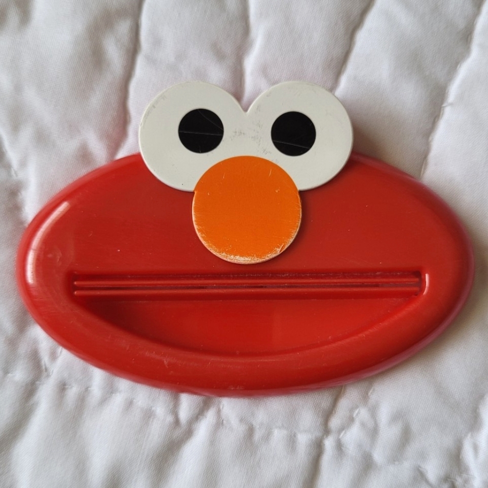 3/$15 🌸 Squeez It Sesame Street Elmo Toothpaste Squeezer